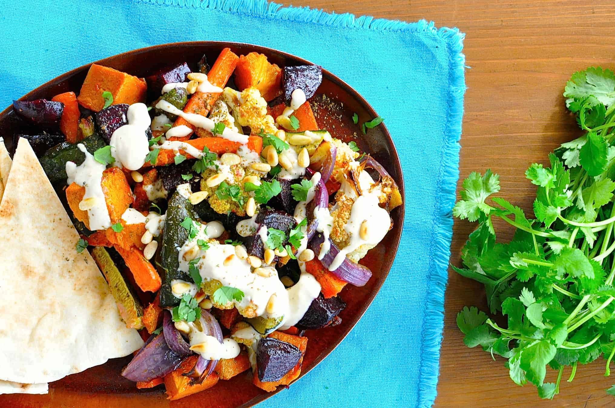 Middle Eastern Roasted Vegetables with Tahini Sauce {Vegan} - great way to use up leftover veggies, insanely simple, ridiculously tasty. Especially love the sauce!