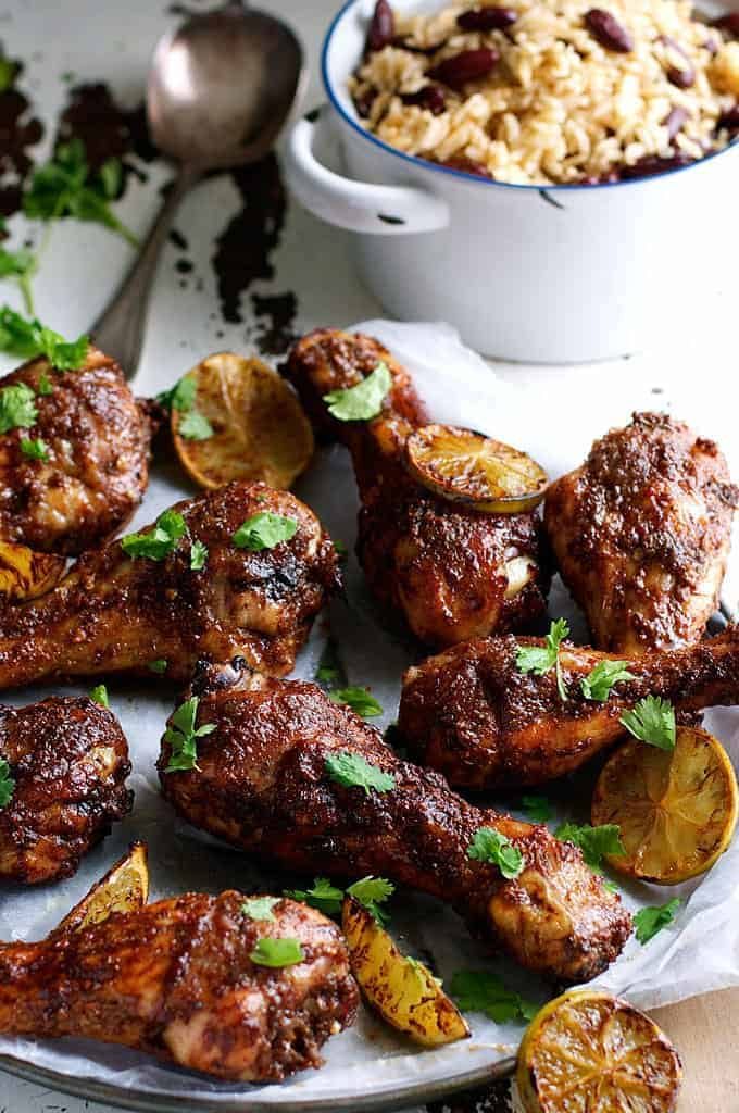 Jamaican Jerk Chicken Drumsticks and Caribbean Rice with Red Beans - the strong, spicy flavours of this chicken is the best from the Caribbean! Easy to make with everyday ingredients.