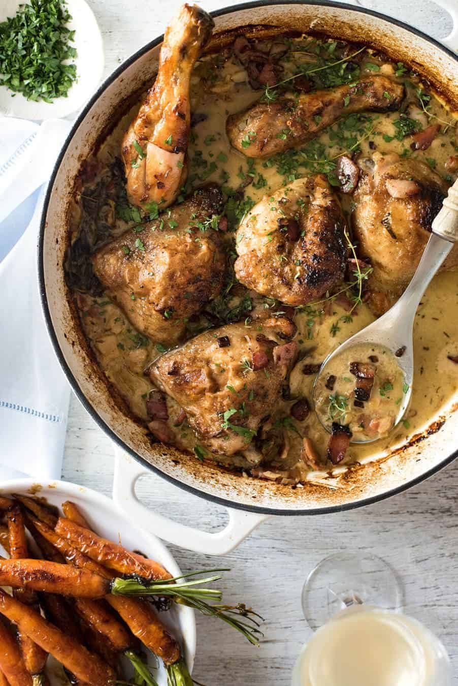 Chicken with Creamy White Wine Sauce and Bacon - So easy to prepare, then just let it braise in the oven until the chicken is tender. The sauce is incredible! www.recipetineats.com