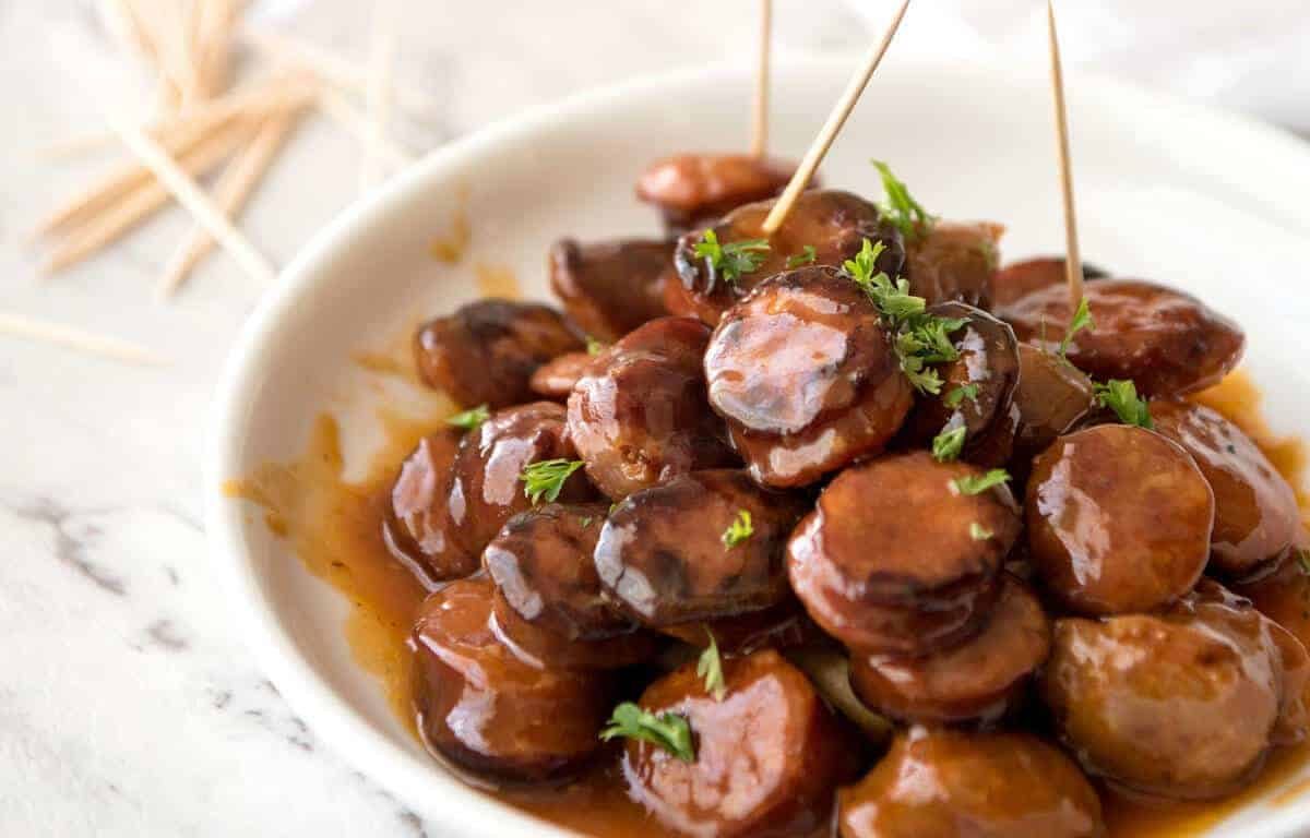 Chorizo Bites in Sweet & Spicy Sauce - these make fantastic finger food for parties and are great for making ahead! recipetineats.com