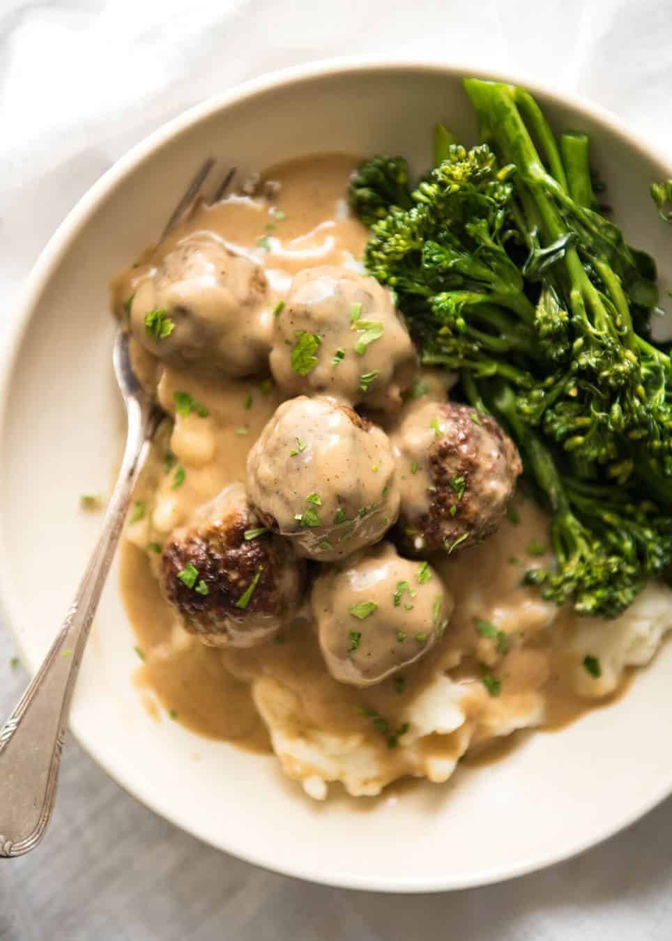 Swedish Meatballs - With a tip for extra soft and tasty meatballs, smothered in a gorgeous creamy sauce. No more Ikea meatballs! recipetineats.com
