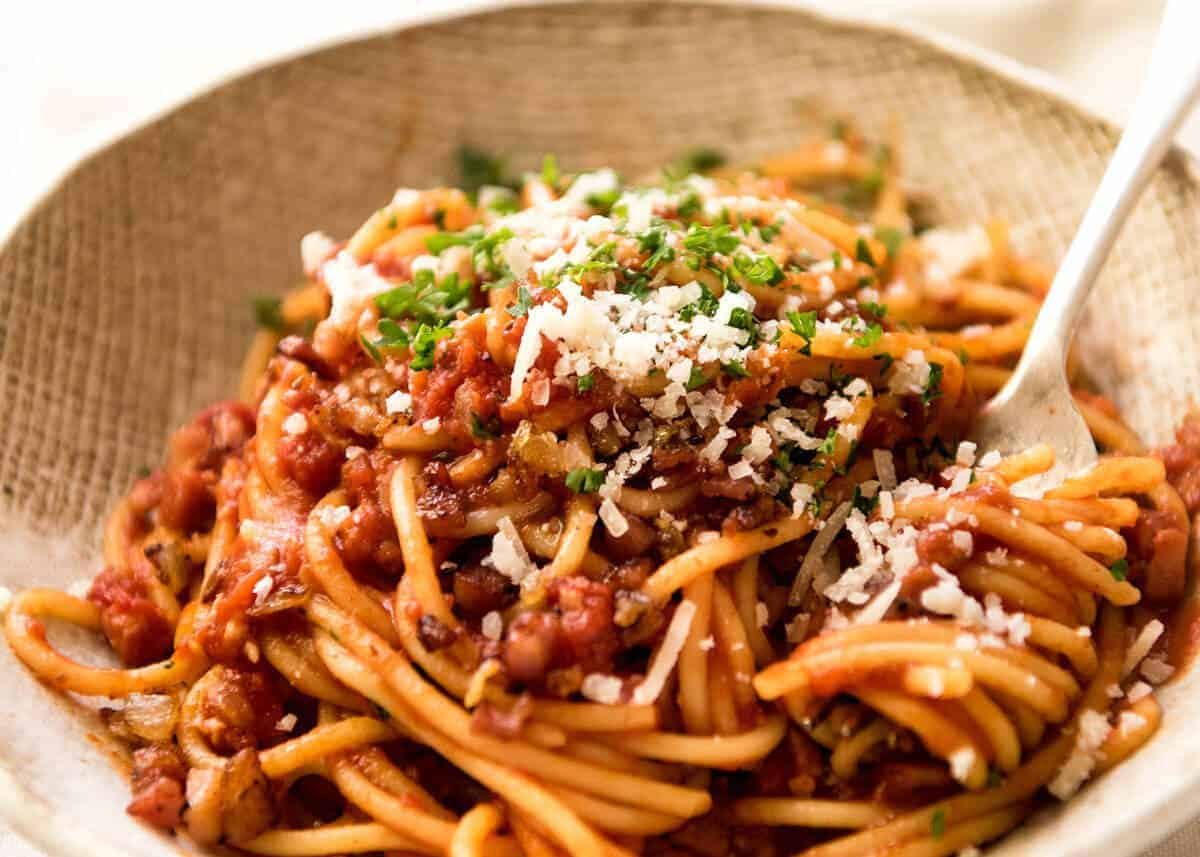 Simplicity at its best - Bacon Tomato Pasta. 5 ingredients. Utterly irresistible. recipetineats.com