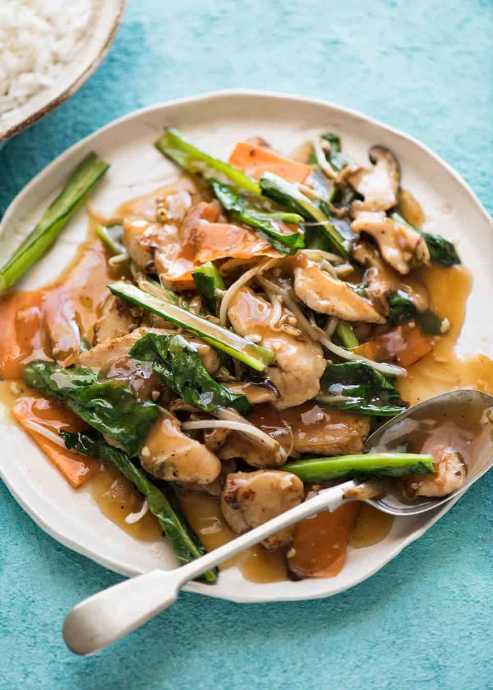 Chop Suey / Chicken Stir Fry on a rustic white plate, ready to be served