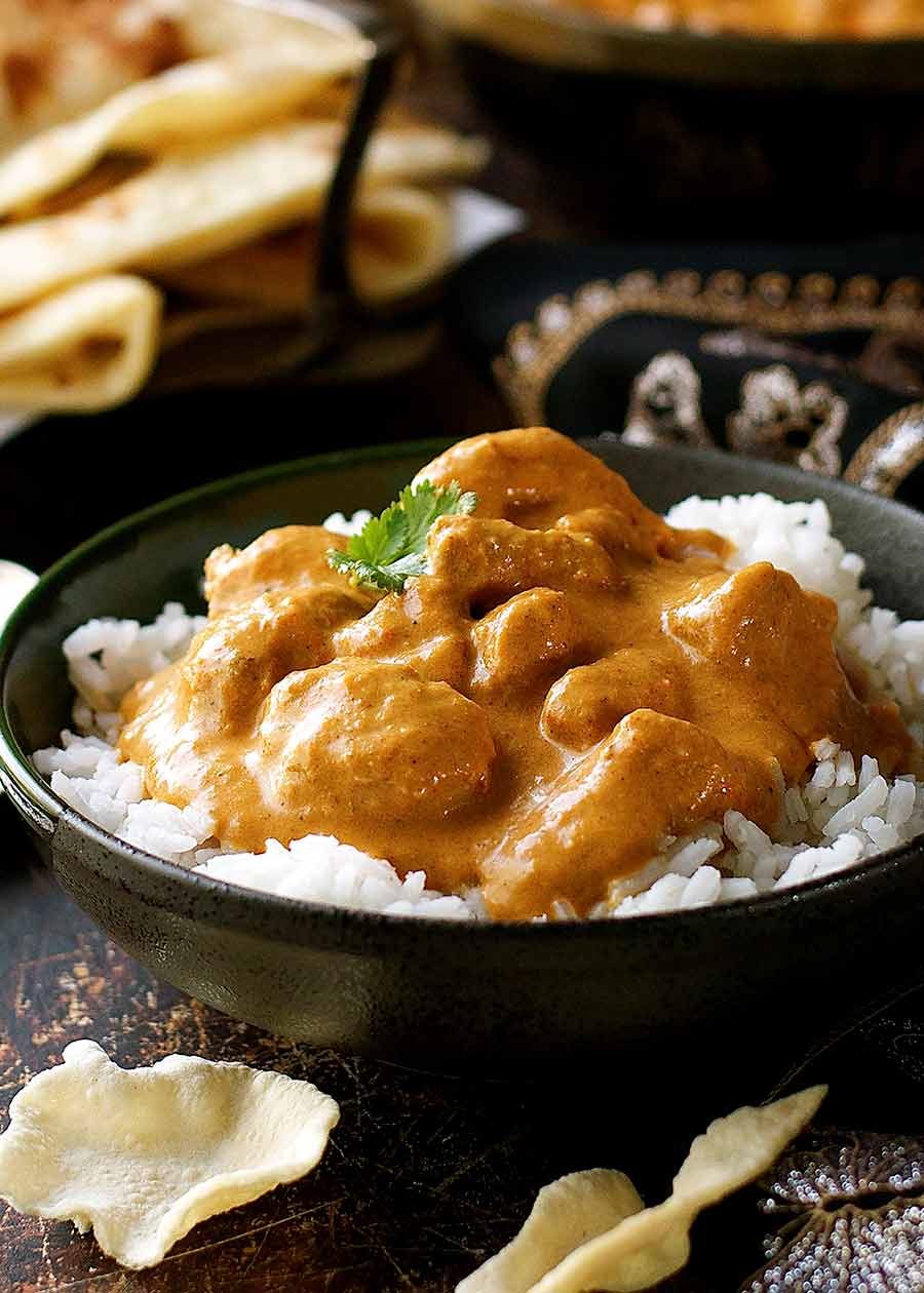 Butter Chicken served over basmati rice in a bowl, ready to be served