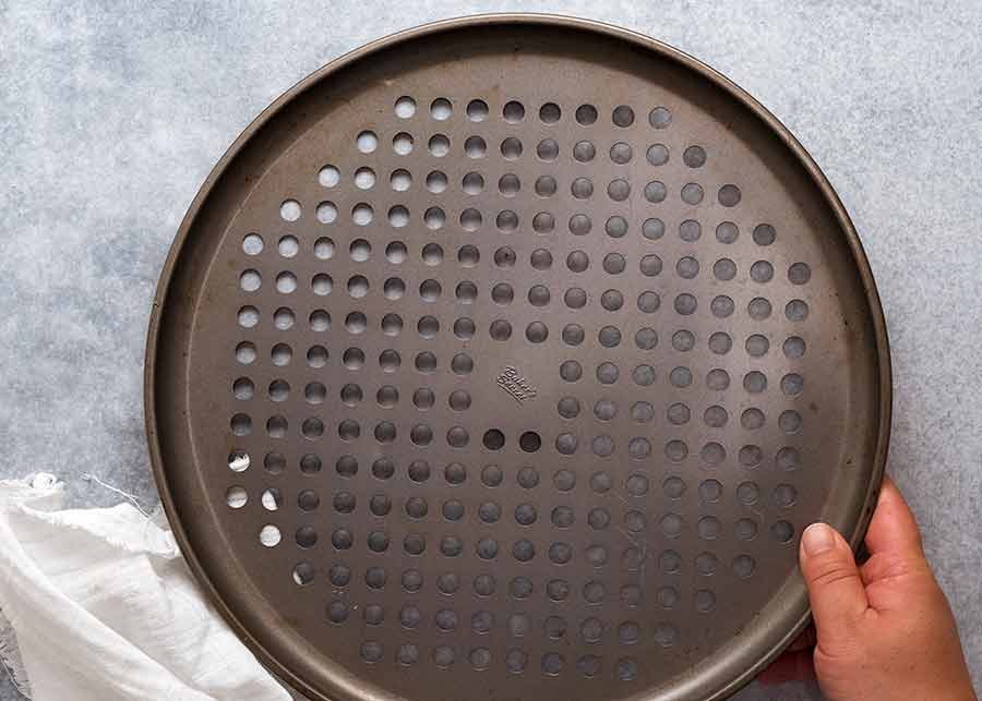 Close up showing crumb structure of homemade pizza dough / pizza crust