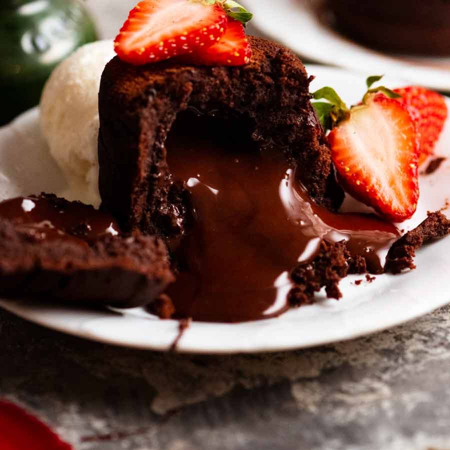 Close up of Molten Chocolate Cake with chocolate lava pouring out