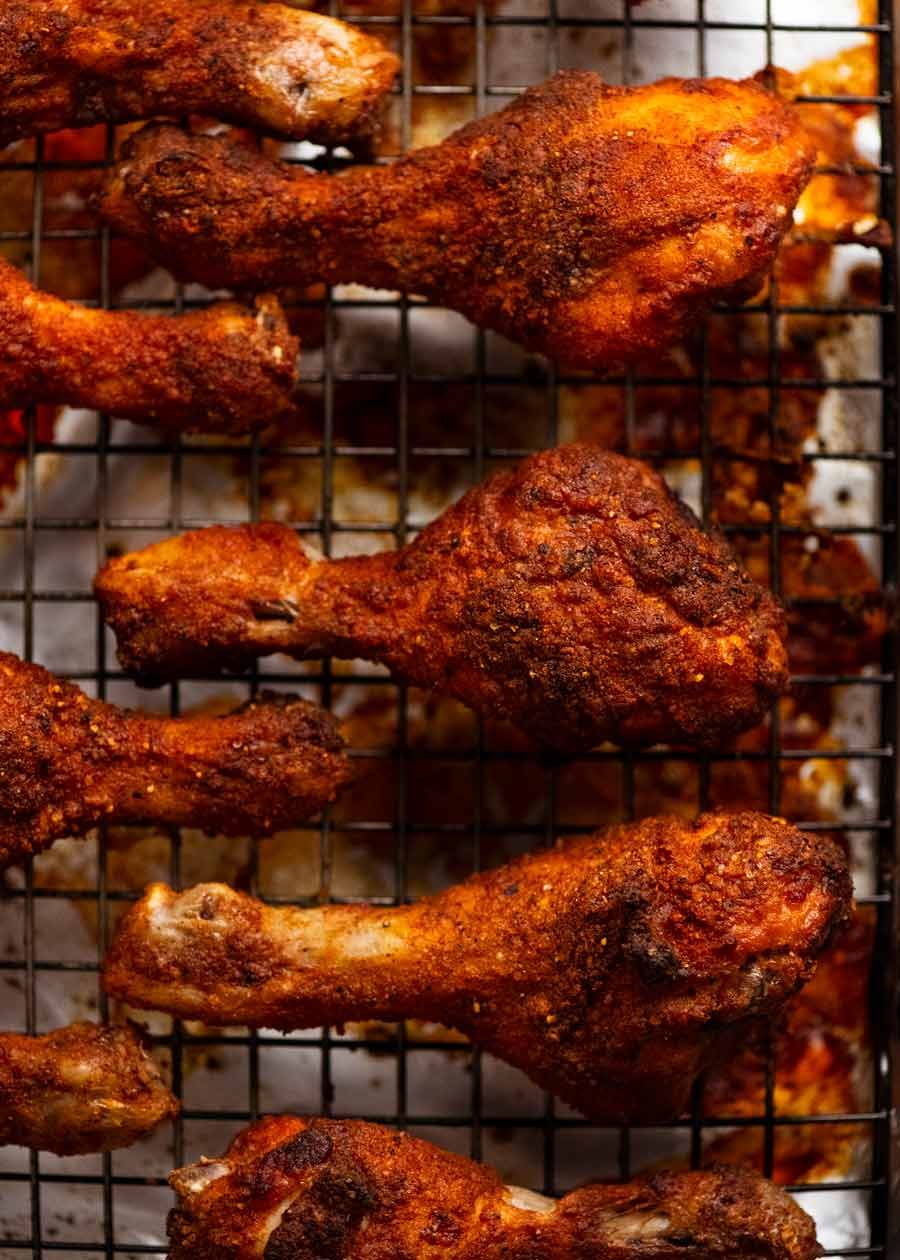 Crispy Baked Chicken Drumsticks on a tray, fresh out of the oven