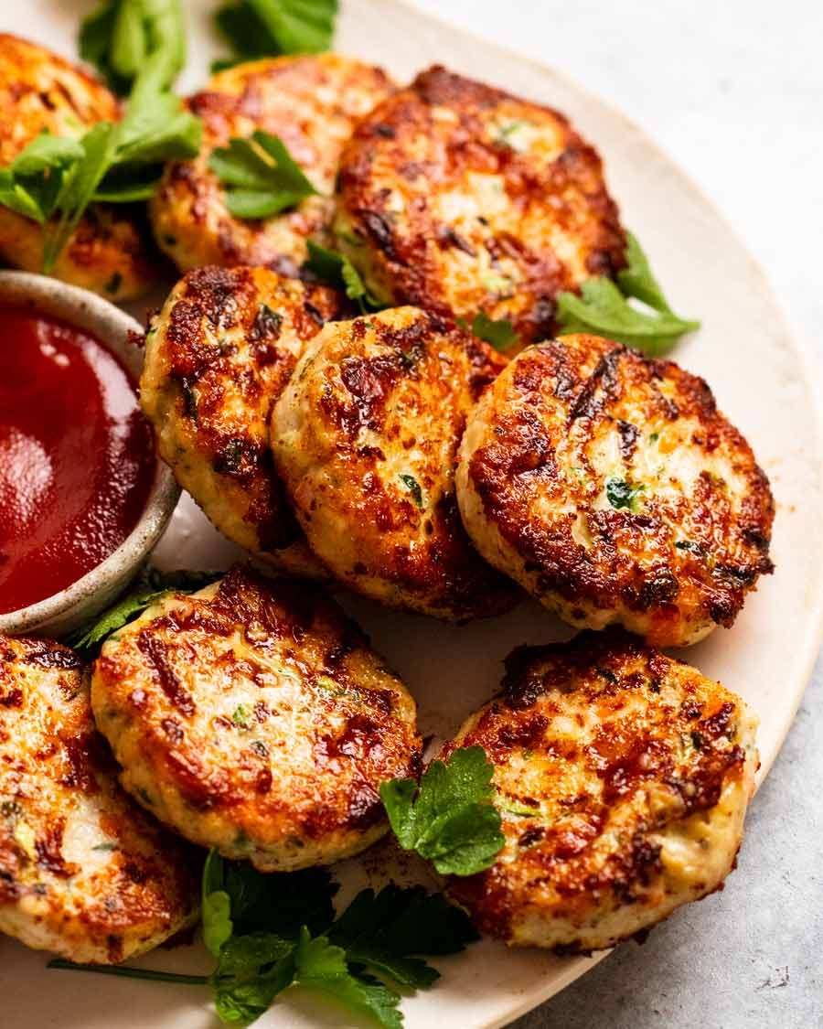 Close up of freshly cooked Chicken rissoles (chicken patties) ready to be served